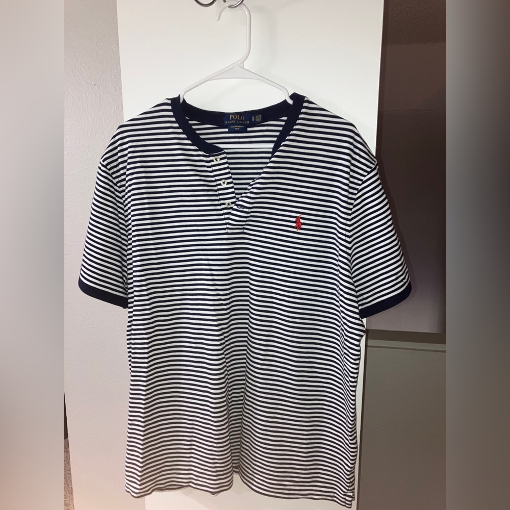 polo xl feather weight mesh.  XL Washed once and shrunk to LG never worn